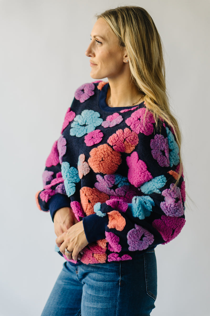 The Flanagan Sherpa Flower Detail Sweater in Navy + Fuchsia