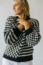 The Bradshaw Checkered Sweater in Black