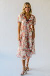 The Linford Floral Midi Dress in Peach + Red