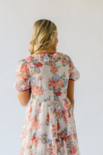 The Linford Floral Midi Dress in Peach + Red