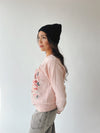 The Whimsical Nutcracker Graphic Sweatshirt in Pink