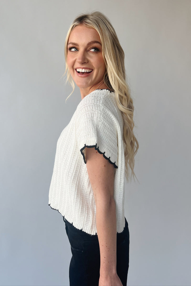 The Shelly Scallop Edge Sweater in Ivory + Black
