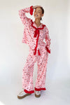 The Holly Jolly Ruffle Pajama Set in Pink + Red