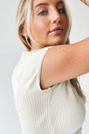 The Lyra Ribbed Button-Up Blouse in Ivory