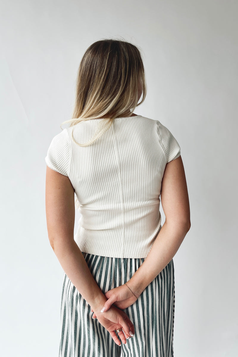 The Lyra Ribbed Button-Up Blouse in Ivory