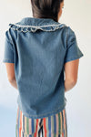 The Marasol Ruffle Collared Blouse in Denim