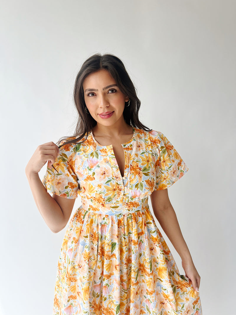 The Romero Floral Flutter Sleeve Maxi Dress in Yellow Multi