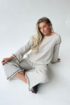 The Lyla Ruffle Edge Striped Pant in Cream + Brown