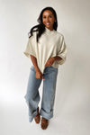 The Trisney Mock Neck Sweater in Ivory