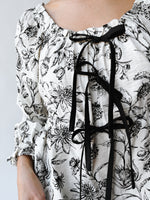 The Tola Tie Detail Blouse in Black Floral