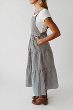 The Marilyn Overall Ruffled Maxi Dress in Navy
