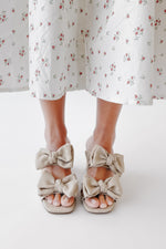 The Oscarson Double Bow Block Heel in Beige