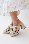The Oscarson Double Bow Block Heel in Beige