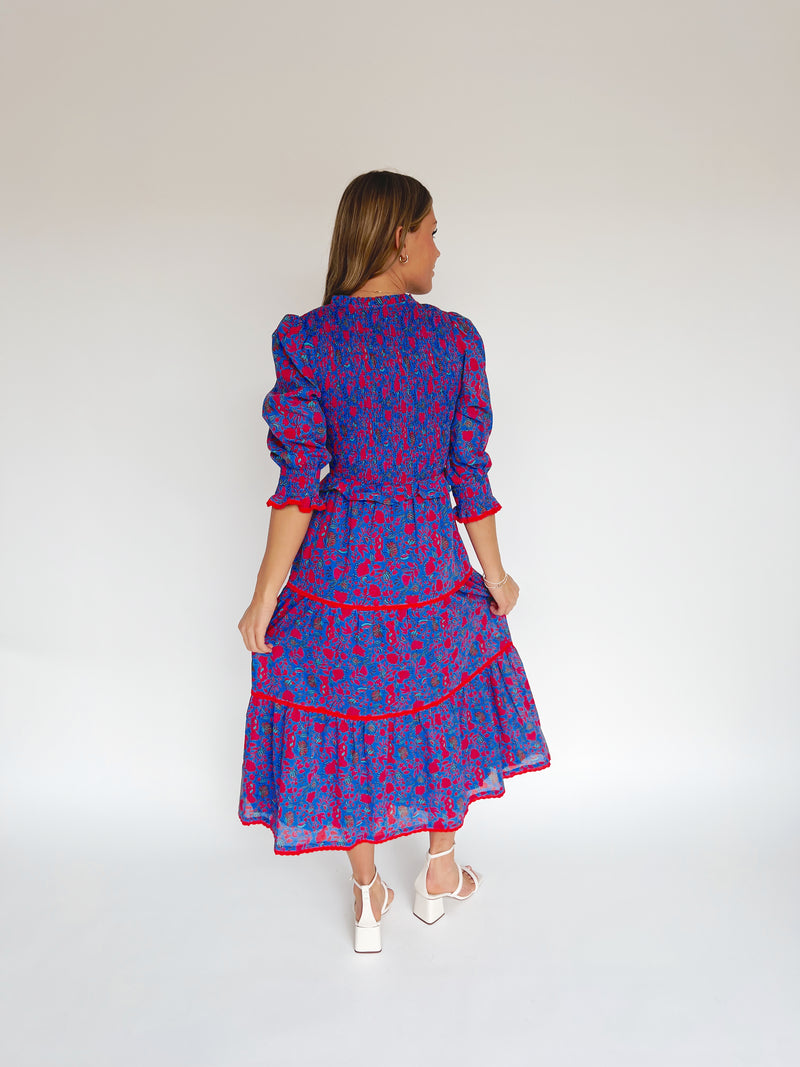 The Snook Smocked Floral Midi Dress in Blue + Fuchsia