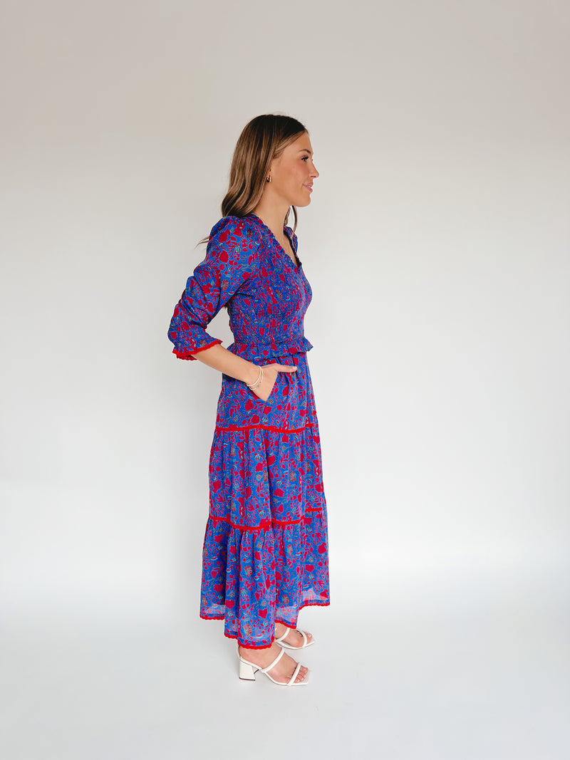 The Snook Smocked Floral Midi Dress in Blue + Fuchsia
