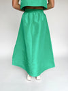 The Caryn Metallic Maxi Skirt in Kelly Green