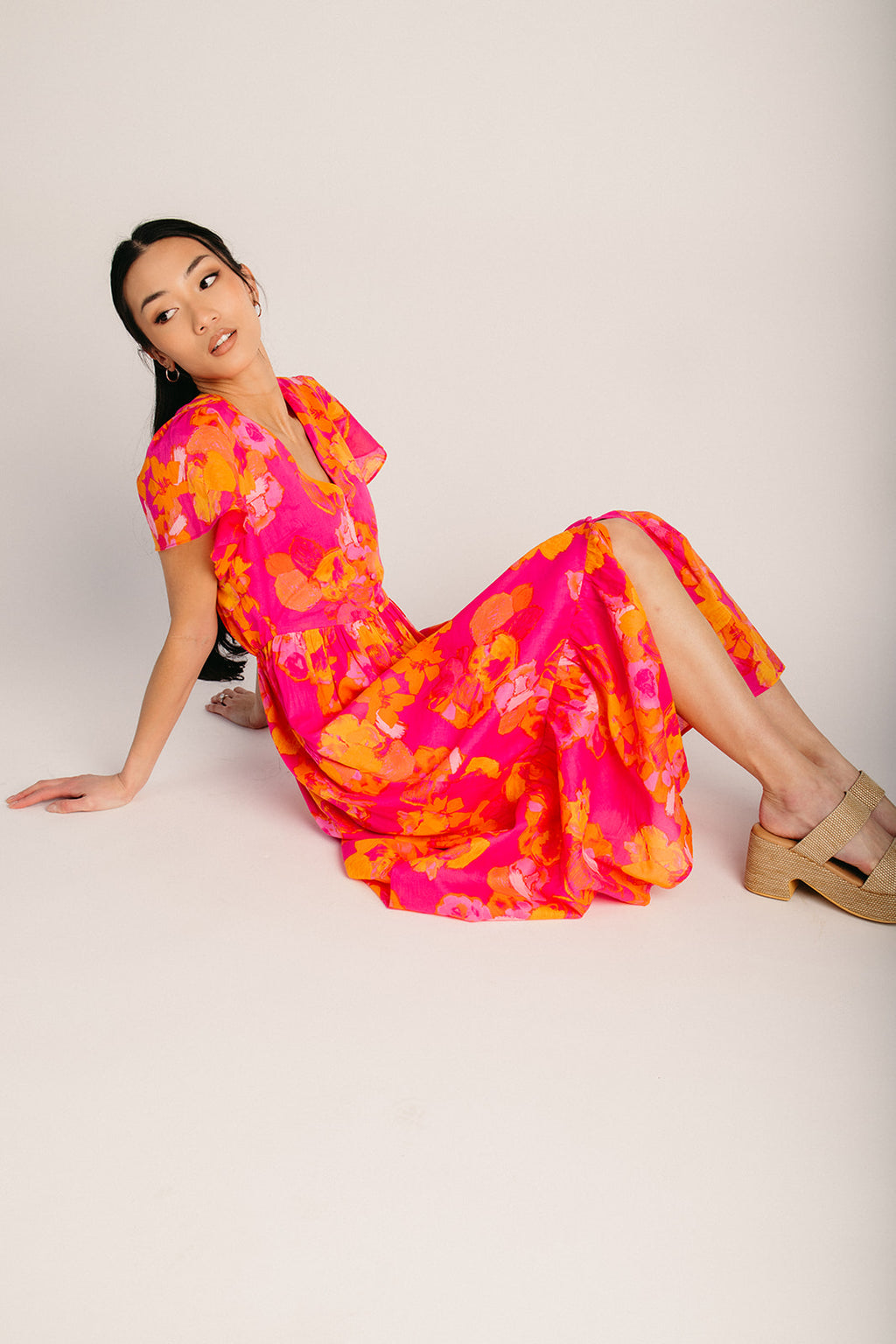 The Elaris Floral Button-Up Midi Dress in Fuchsia + Orange Multi