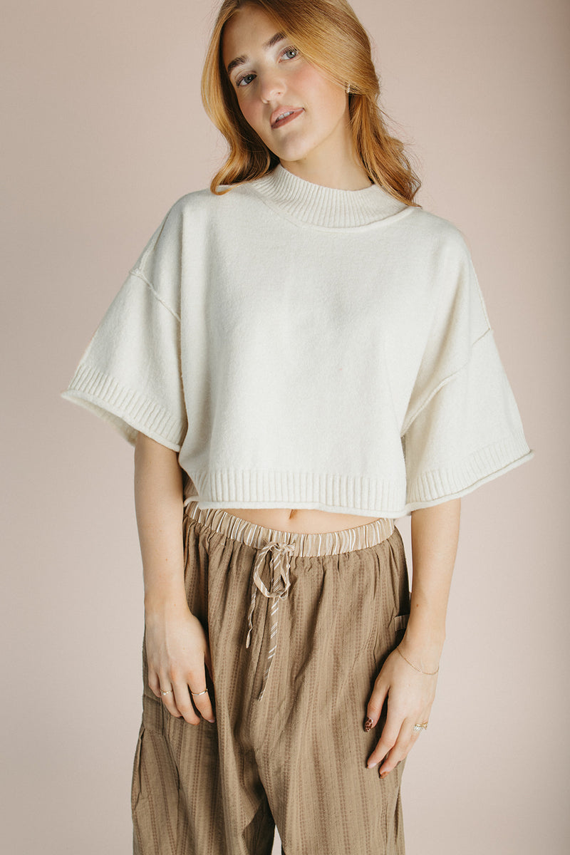 The Trisney Mock Neck Sweater in Ivory
