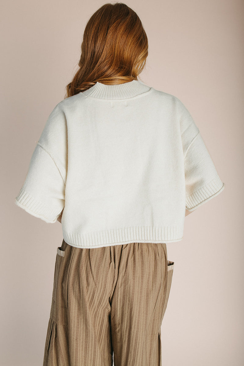 The Trisney Mock Neck Sweater in Ivory