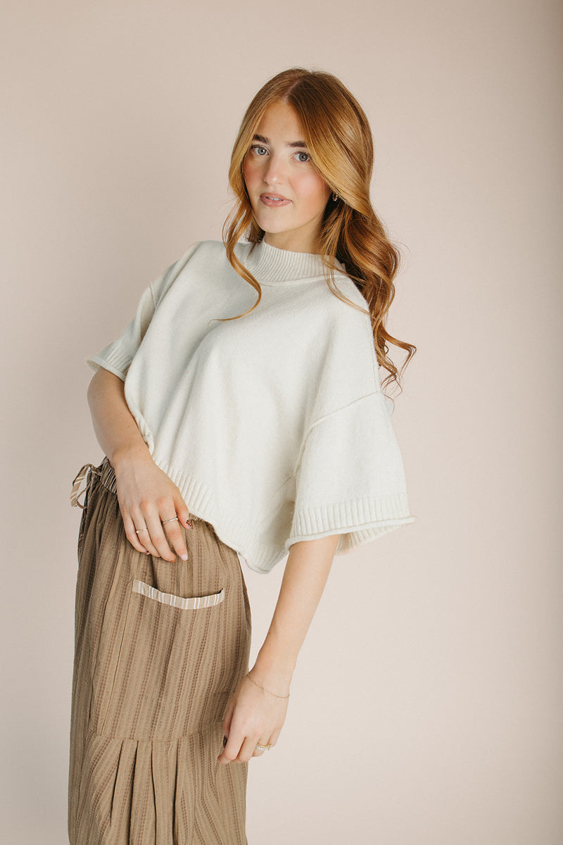 The Trisney Mock Neck Sweater in Ivory