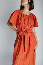 The Tessie Striped Linen Midi Dress in Orange