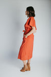 The Tessie Striped Linen Midi Dress in Orange
