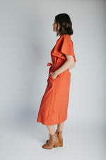 The Tessie Striped Linen Midi Dress in Orange