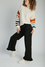 The Layna Ruffle Hem Pant in Black