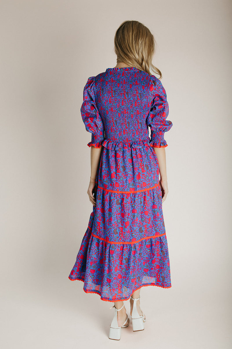 The Snook Smocked Floral Midi Dress in Blue + Fuchsia