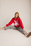 The Retro Santa Holiday Sweater in Cherry Red