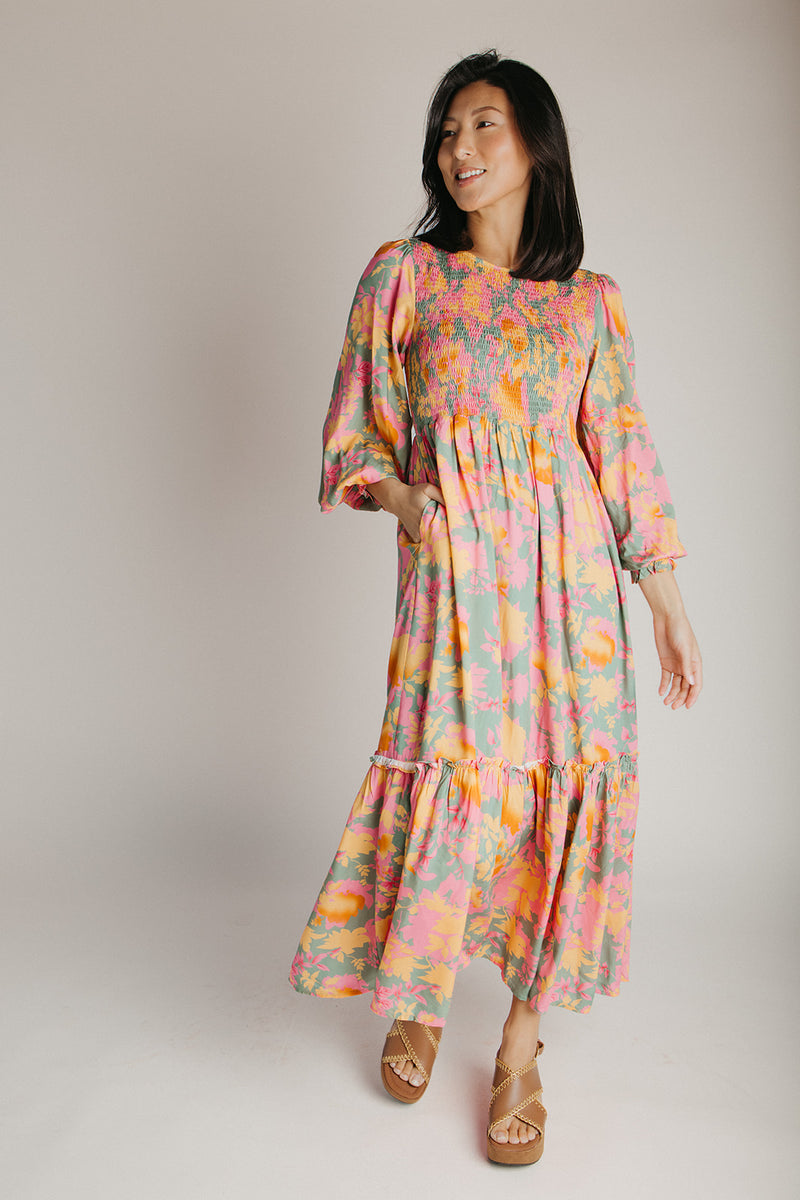 The Kensley Smocked Bodice Maxi Dress in Olive Floral