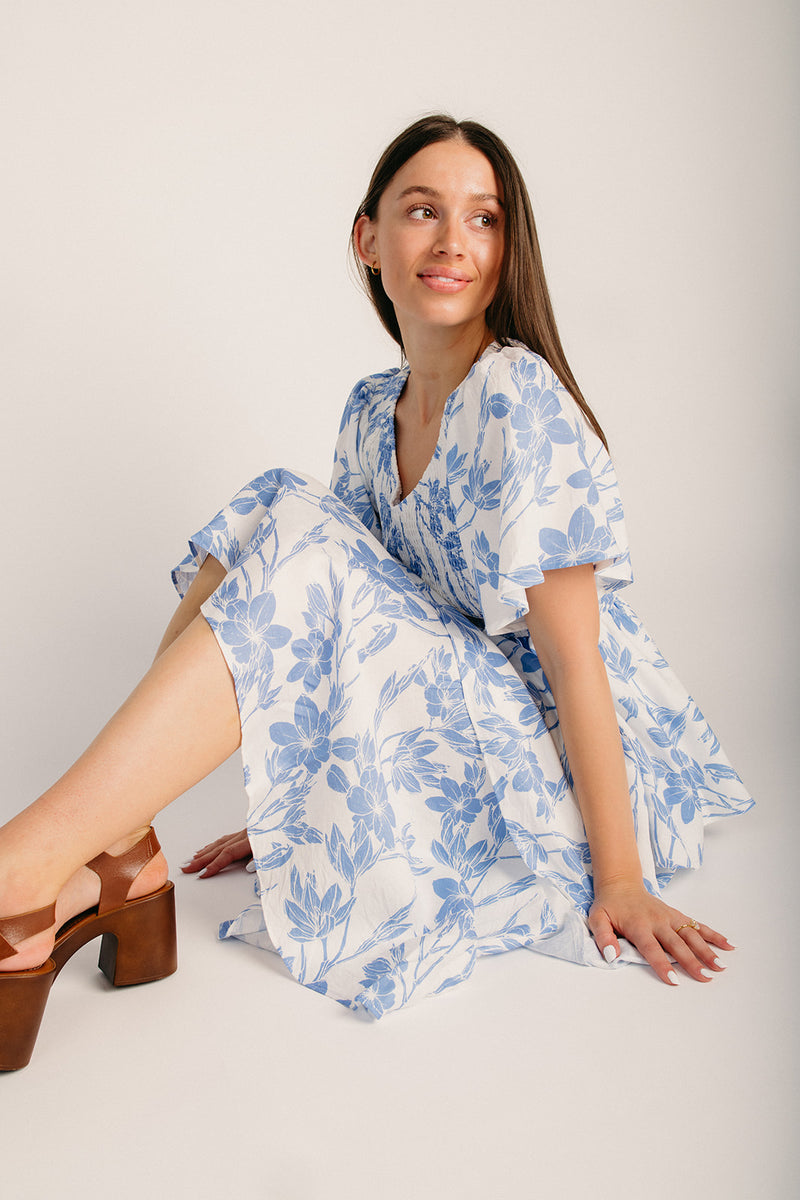 smocked blue midi dress Dex Light Blue Smocked Midi Dress-Final Sale Little Bird Boutique