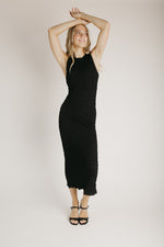 The Amberlyn Sleeveless Sweater Dress in Black