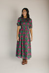 The Kristin Floral Smocked Maxi Dress in Kelly Green + Pink