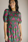 The Kristin Floral Smocked Maxi Dress in Kelly Green + Pink