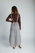 The Marilyn Overall Ruffled Maxi Dress in Navy