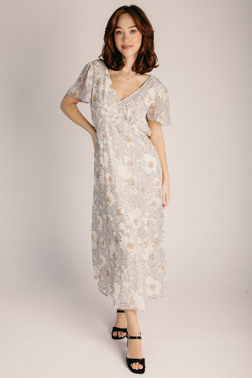 The Sylvania Flutter Sleeve Midi Dress in Natural + Dusty Peach Medium The Sylvania Flutter Sleeve Midi Dress in Natural + Dusty Peach Medium