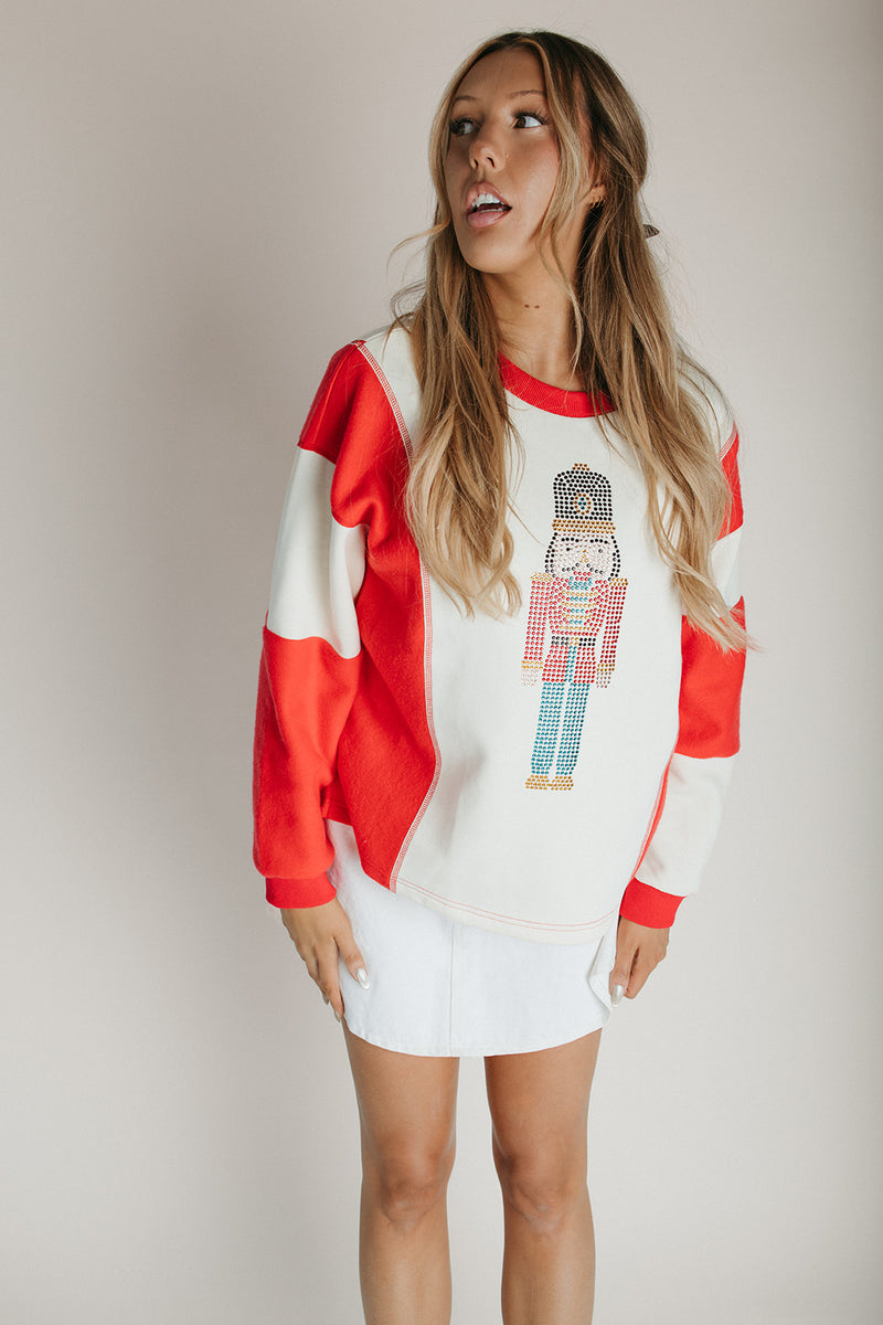 The Nutcracker Embellished Pullover in Cream + Red