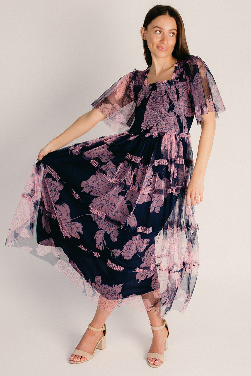 The Sunstrom Floral Ruffle Midi Dress in Navy  Piper & Scoot