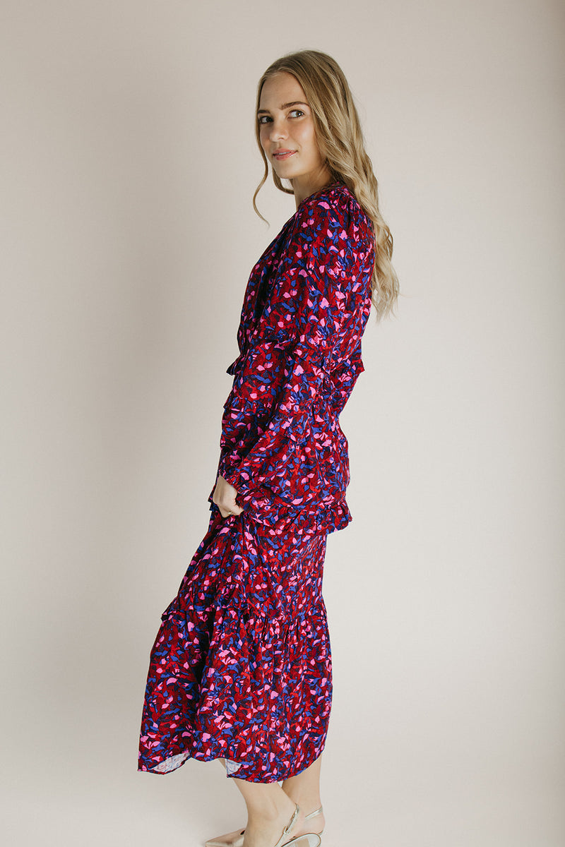 The Turma Tiered Maxi Dress in Burgundy + Pink