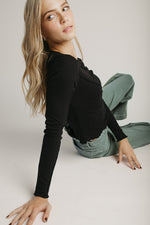 The Ginny Asymmetrical Long Sleeve Tee in Black