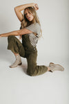 The Clemons Corduroy Flare Overall in Olive