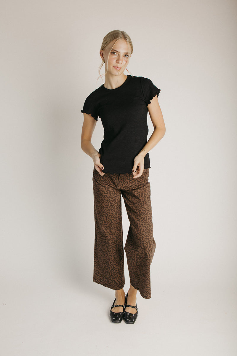 The Kyra Ruffle Hem Tee in Black