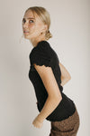 The Kyra Ruffle Hem Tee in Black