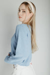 The Jori Knit Button-Up Cardigan in Powder Blue