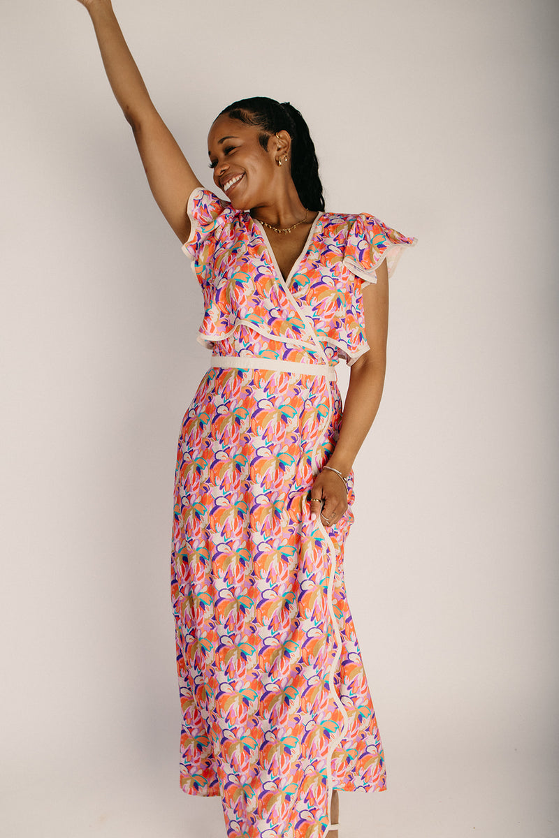 The Longoria Scalloped Hem Wrap Dress in Peach Floral Large