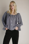 The Donaldson Gingham Ruffle Blouse in Black