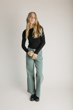 The Ginny Asymmetrical Long Sleeve Tee in Black