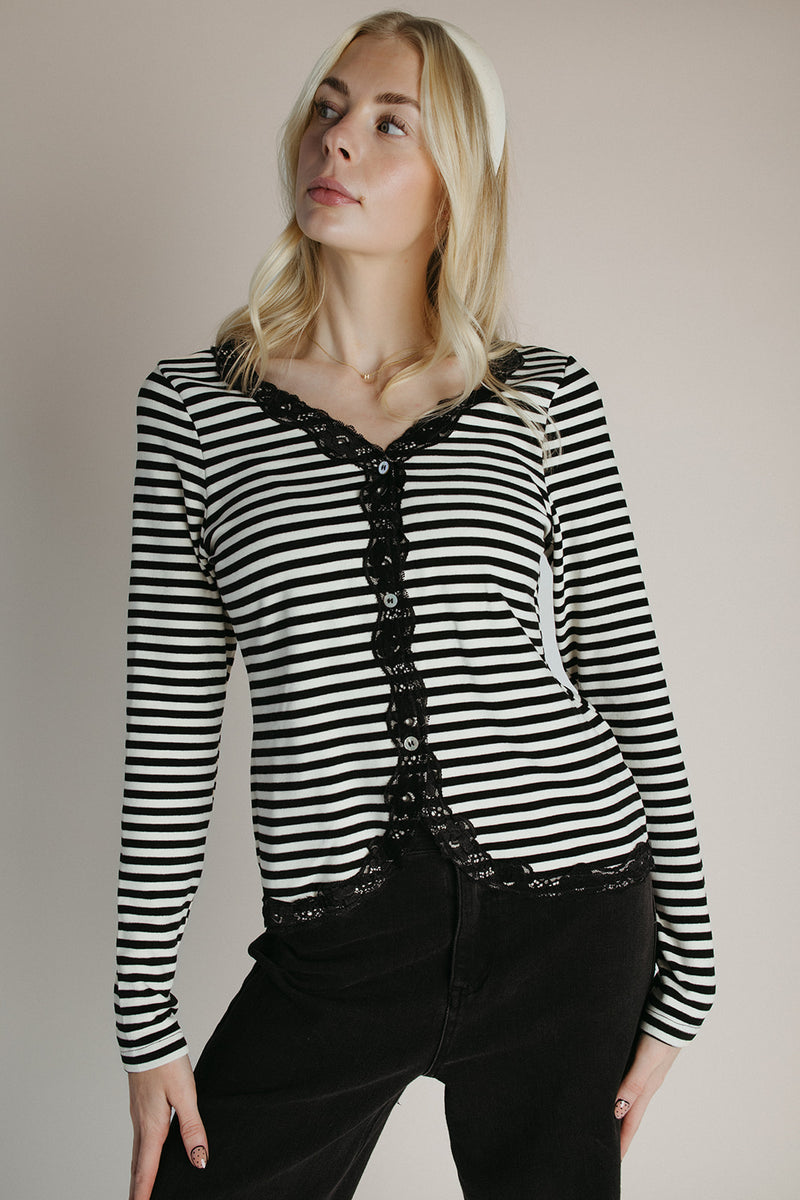 The Evangeline Lace Trim Cardigan in Ivory + Black