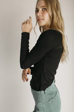 The Ginny Asymmetrical Long Sleeve Tee in Black